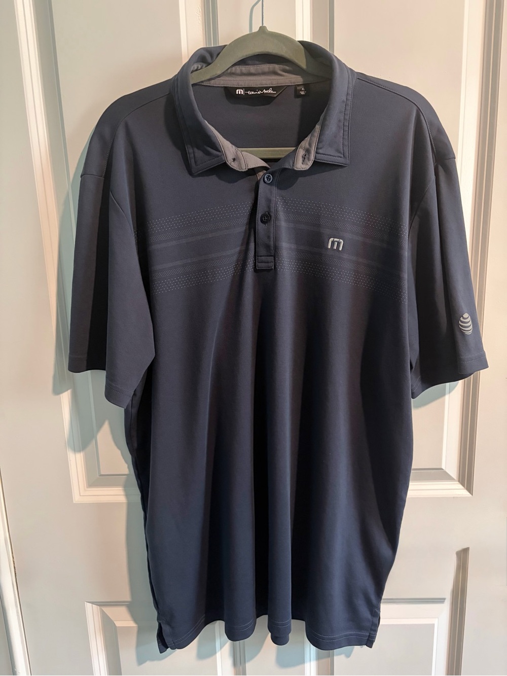 Travis Mathew Men’s Dark Navy Golf Polo with Subtle Stripe